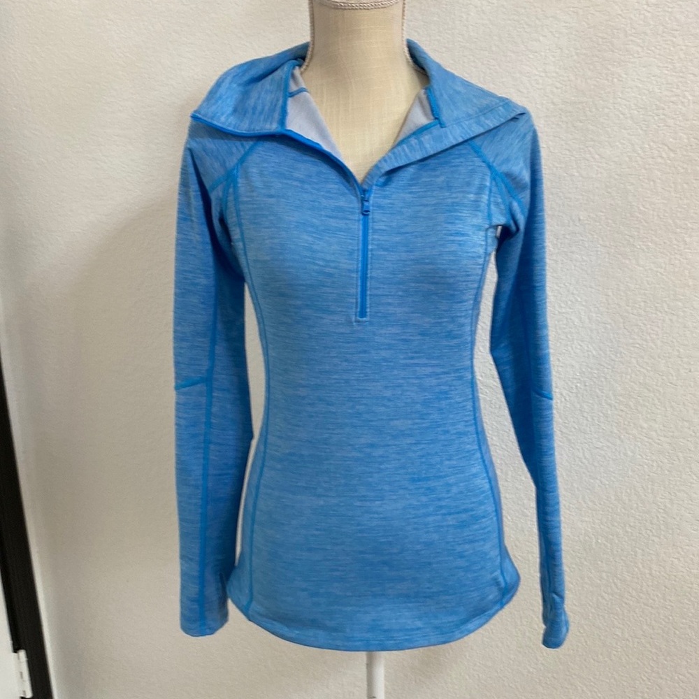 Under Armour.  Long sleeve Moisture wicking shirt. Excellent condition. Size S